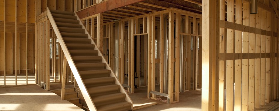 interior of house under construction wood framing studs